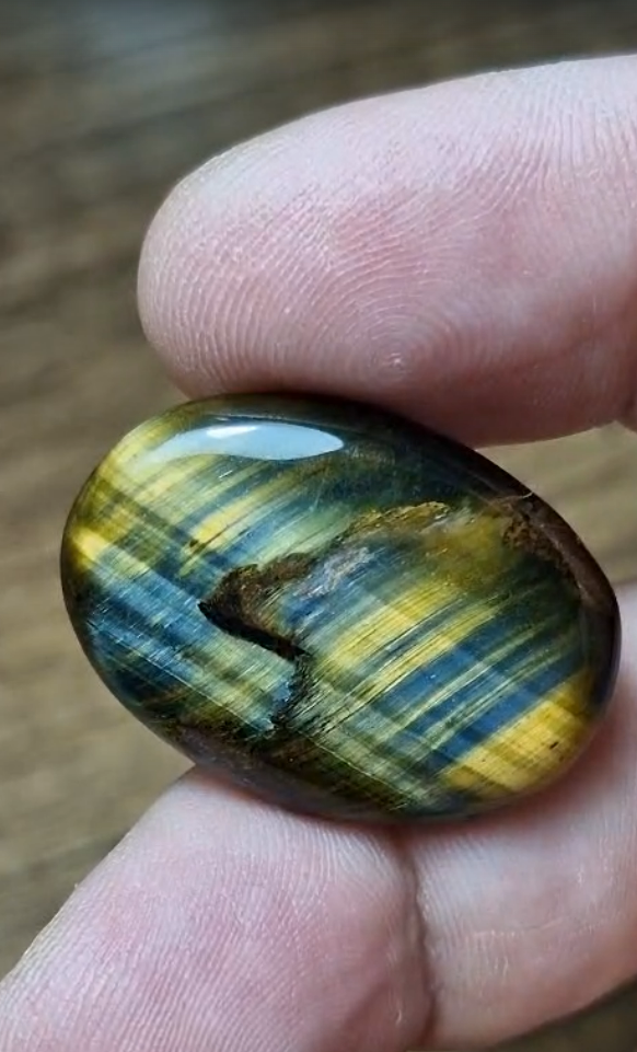 30.00ct 30x21.3mm Oval Natural Bi Color Tiger Eye