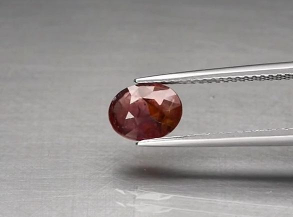 1.59ct 7.7x6mm Oval Pinkish Orange Sapphire Unheated Mozambique