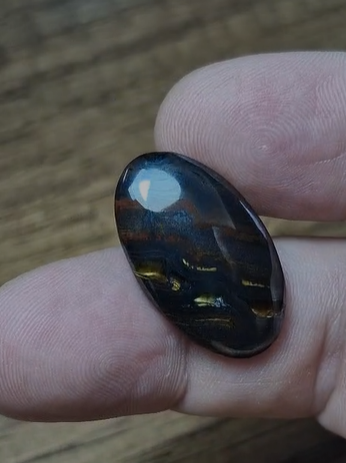 21.95ct 27.5x16.3mm Oval Natural Bi Color Tiger Eye