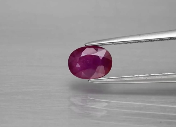 1.21ct 7x5.2mm Oval Reddish Purple Sapphire, Tanzania