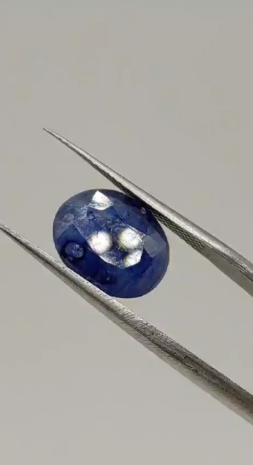 5.55ct 12.1x9.5mm Oval Natural Sapphire ( Heated Glass Filling)