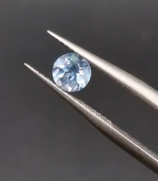 0.67ct 5mm Round Natural Sky Blue Topaz