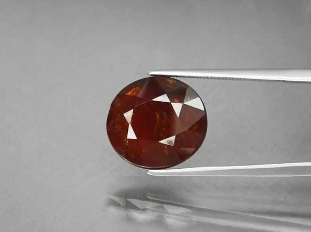 11.77ct 14.2x13mm Oval Natural Medium Orange Spessartite Garnet, Namibia